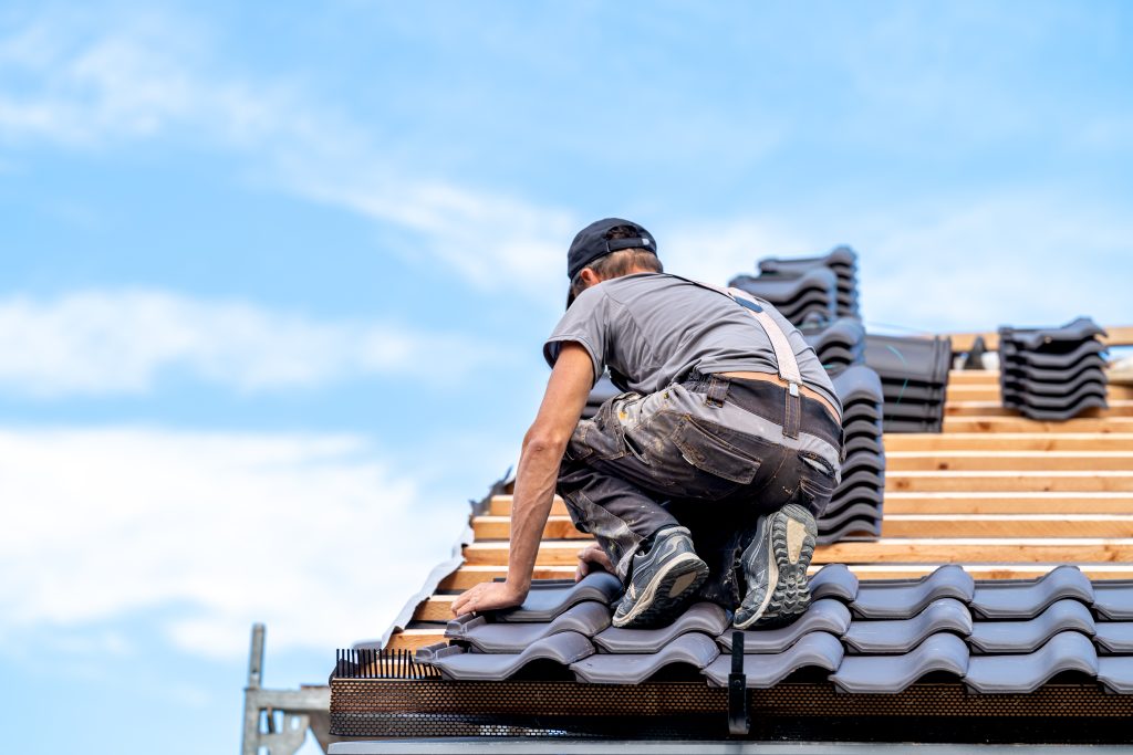 installation of the roof of a new building from ceramic tiles.
