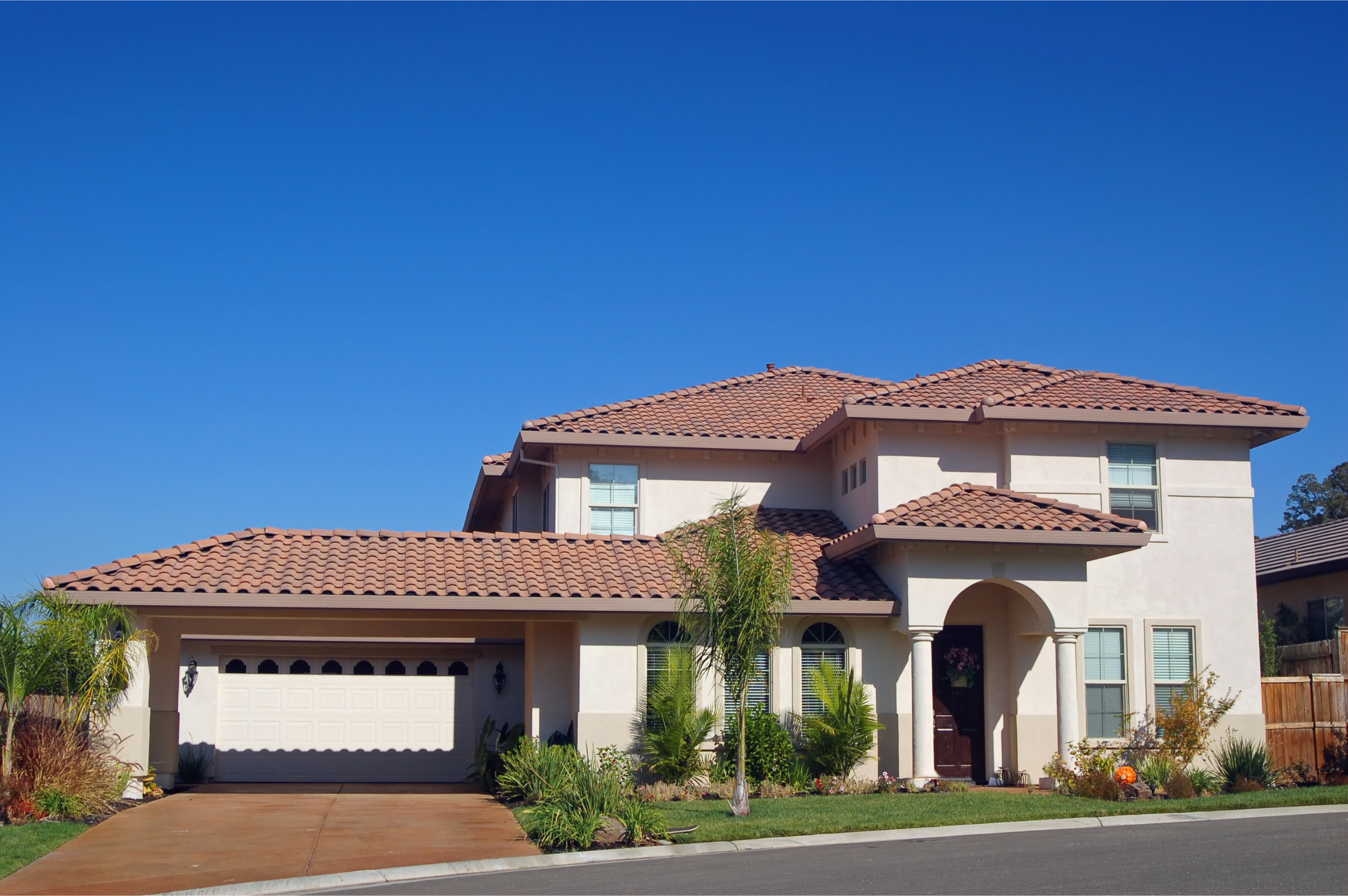 suburban home with a tile roof